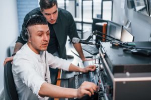 conception-of-teamwork-two-guys-is-indoors-in-the-radio-studio-is-busy-by-broadcast.jpg
