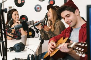 image-of-young-happy-caucasian-people-performing-at-radio-program.jpg